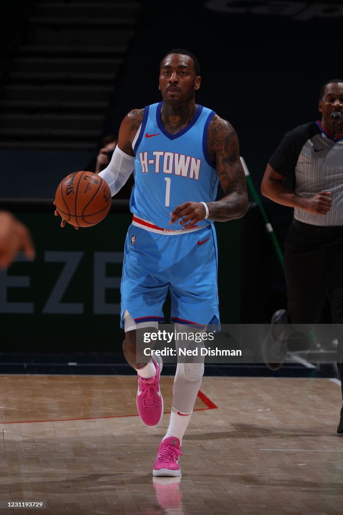 John Wal Rockets John Wall of the Houston Rockets handles the ball against the... News ...