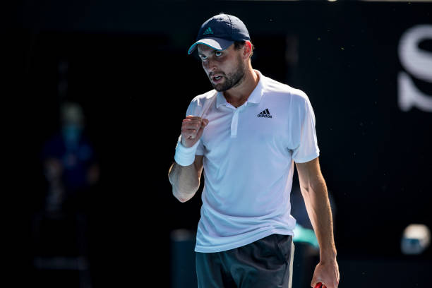 Aslan Karatsev of Russia celebrates after winning a game during the quarterfinals of the 2021 Australian Open on February 16 2021, at Melbourne Park...