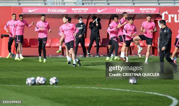 Sevilla's players exercise during a training session at the Ciudad Deportiva Jose Ramon Cisneros Palacios training ground in the outskirts of Seville...