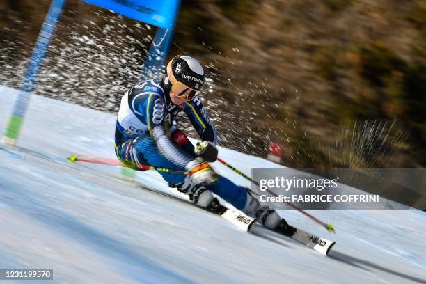 Swedish Estelle Alphand competes in the first run of the round of 16 series of the Women's Parallel Giant Slalom event on February 16, 2021 at the...