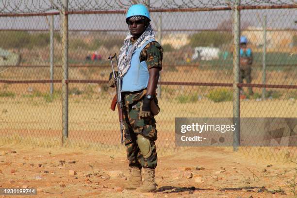 The United Nations-African Union peacekeeping mission in Sudans Darfur region hands over its sector headquarters to the Sudanese government in Khor...