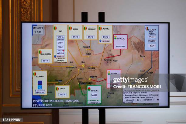 This photograph shows a map of French army locations in Sahel, as French President delivers his speech after a meeting with leaders of the G5 Sahel,...