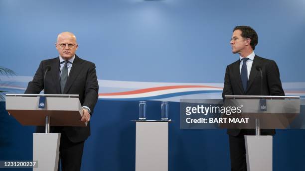 Outgoing Prime Minister Mark Rutte and outgoing Minister for Security and Justice Ferd Grapperhaus give a press conference in The Hague, on the...