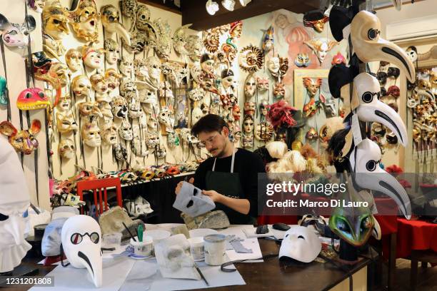 Mask Maker Davide Belloni, 38-years-old, owner of the Ca'Macana atelier is seen at work on February 16, 2021 in Venice, Italy. The tradition of the...