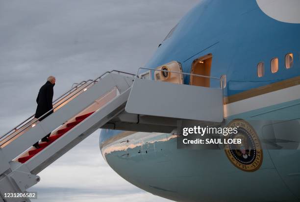 President Joe Biden boards Air Force One upon prior to departure from Joint Base Andrews in Maryland, February 16 as he travels to Milwaukee,...