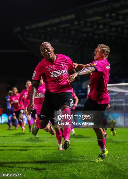Andre Wisdom of Derby County celebrates scoring the winning goal with Martyn Waghorn during the Sky Bet Championship match between Wycombe Wanderers...