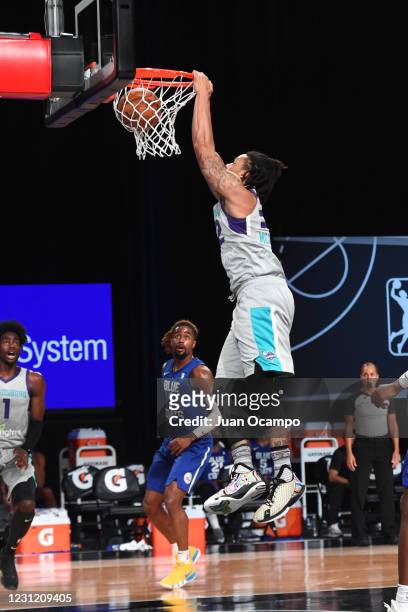 McDaniels of the Greensboro Swarm dunks the ball against the Delaware Blue Coats on February 16, 2021 at AdventHealth Arena in Orlando, Florida. NOTE...