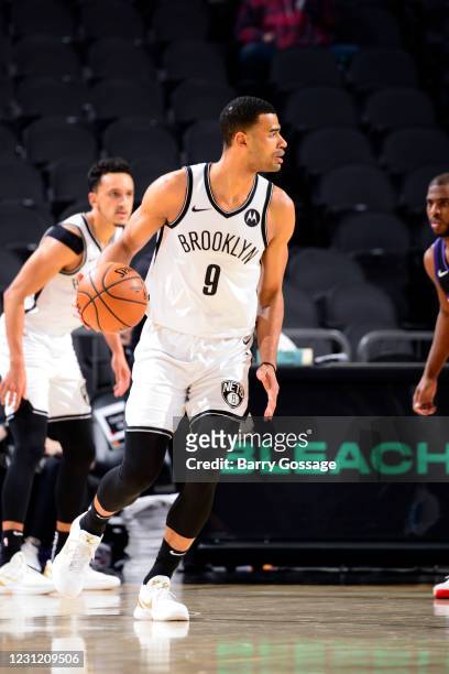 Timothe Luwawu-Cabarrot of the Brooklyn Nets dribbles during the game against the Phoenix Suns on February 16, 2021 at Talking Stick Resort Arena in...