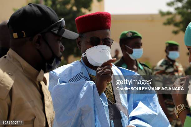 Niger presidential candidate and former Niger president Mahamene Ousmane leader of the Democratic and Republican Renewal CHANGE is greeted by his...