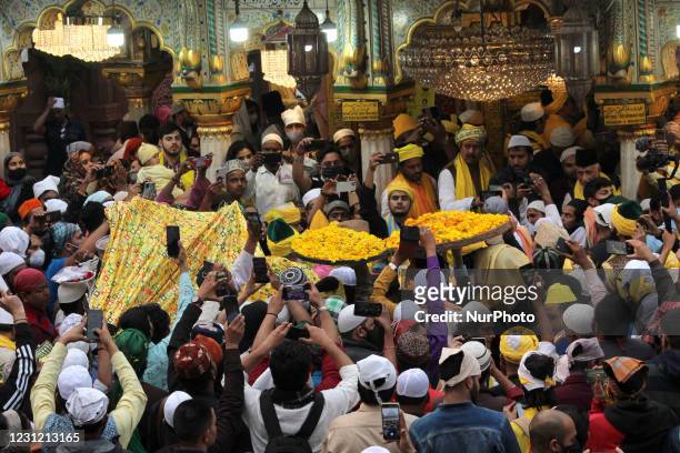 Devouts throng the Nizamuddin Dargah embraced in yellow on the occasion of 'Sufi Basant' on February 16, 2021 in New Delhi, India. The Hindu spring...