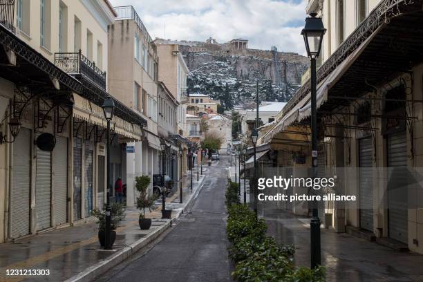February 2021, Greece, Athen: The shutters of the shops in Athens' Monastiraki district are closed. A strict lockdown has been in effect for the...
