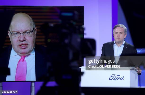 Stuart Rowley , president Ford of Europe, follows a video conferenced statement of German Economy Minister Peter Altmaier , during a press conference...