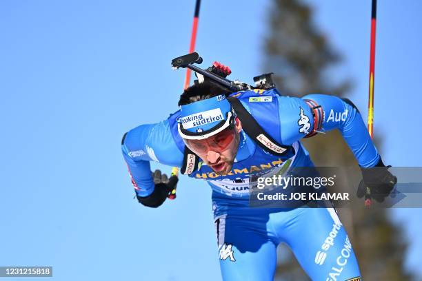 Italy's Dominik Windisch competes in the Men's 20 km Individual event at the IBU Biathlon World Championships in Pokljuka, Slovenia, on February 17,...