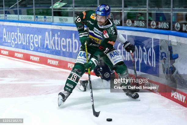 Drew Le Blanc of Augsburg Panther controls the puck during the DEL match between Augsburger Panther and EHC Red Bull Muenchen on February 15, 2021 in...