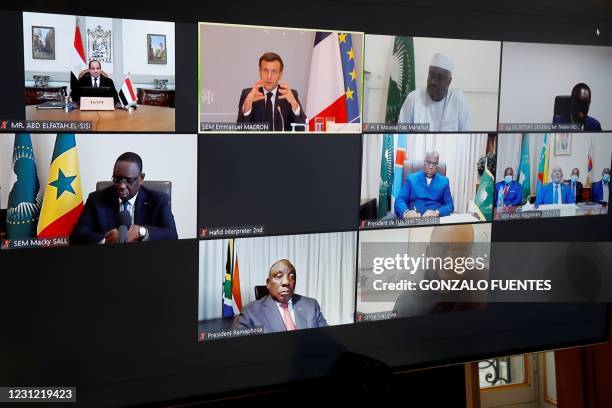 French President Emmanuel Macron attends a video conference meeting with African Union leaders, Egypt's President Abdel Fattah al-Sisi , African...