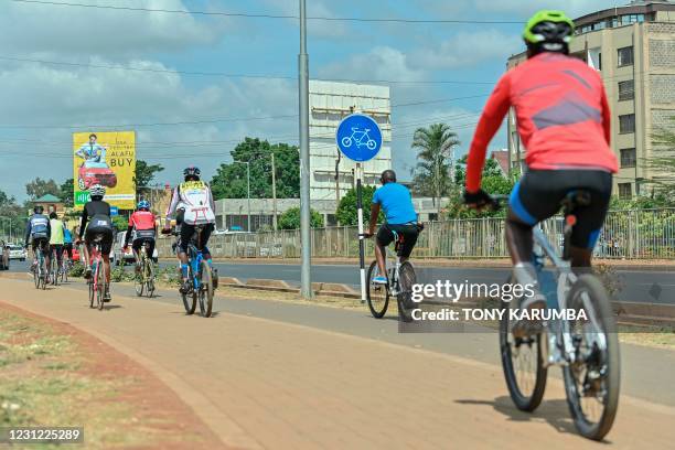 Cyclists take part in the monthly Critical Mass Nairobi group-bike ride around the capital city whose two objectives are getting more people...