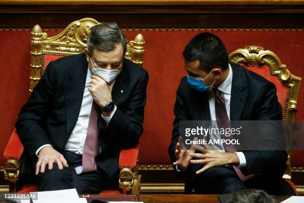 Italian Prime Minister Mario Draghi and Italian Foreign Minister Luigi Di Maio attend the debate ahead of the confidence vote on the new Italian...