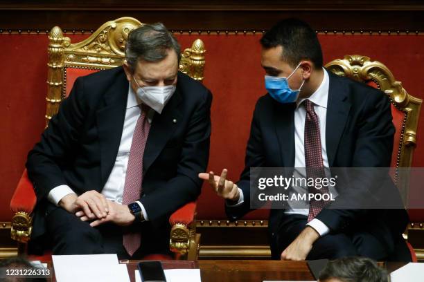 Italian Prime Minister Mario Draghi and Italian Foreign Minister Luigi Di Maio attend the debate ahead of the confidence vote on the new Italian...