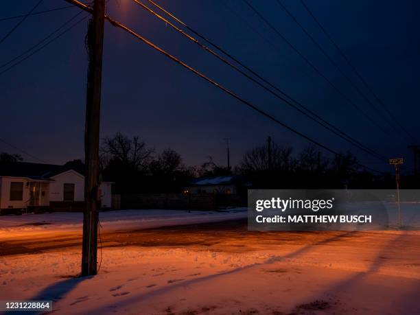 Snow covers the ground in Waco, Texas, on February 17, 2021 as severe winter weather conditions over the last few days has forced road closures and...