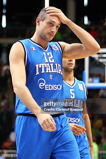 Marco Cusin of Italy looks dejected after losing 68-80 the EuroBasket 2011 first round group B match between France and Latvia at Siauliai Arena on...
