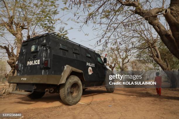 An armoured personnel carrier is stationed inside the Government Science College where gunmen kidnapped dozens of students and staffs, in Kagara,...