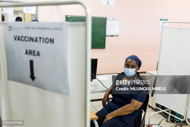 Nurse awaits to receive a dose of the Johnson & Johnson vaccine against the COVID-19 coronavirus as South Africa proceeds with its inoculation...