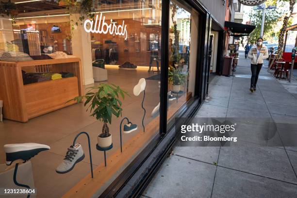 Pedestrian wearing a protective mask walks past an Allbirds Inc. Store in San Francisco, California, U.S., on Wednesday, Feb. 17, 2021. The U.S....
