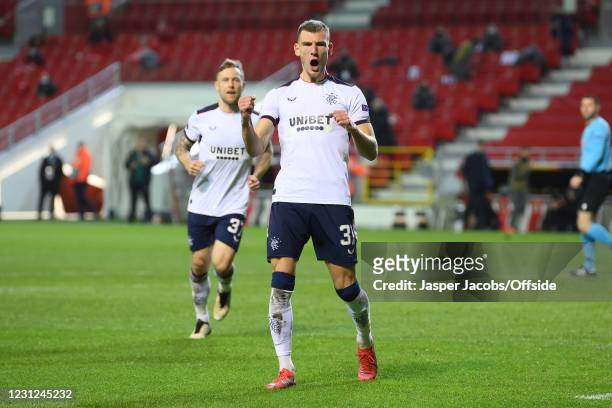 Borna Barisic of Rangers celebrates scoring their 2nd goal from the penalty spot during the UEFA Europa League Round of 32 match between Royal...