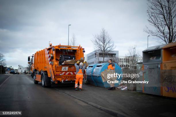 Bonn, Germany Garbage collection drives away waste paper on February 17, 2021 in Bonn, Germany.