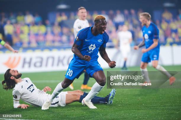 Datro David Fofana of FK Molde celebrates after scoring his teams 3:3 goal during the UEFA Europa League Round of 32 match between Molde FK and 1899...