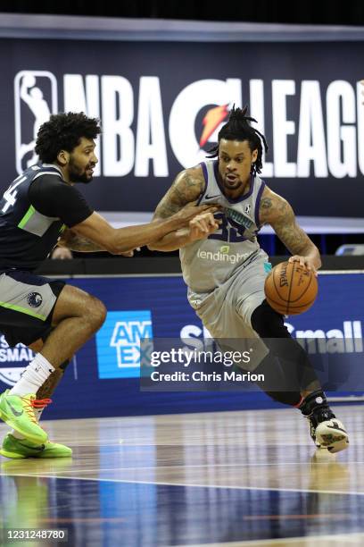 McDaniels of the Greensboro Swarm drives to the basket against the Iowa Wolves on February 18, 2021 at HP Field House in Orlando, Florida. NOTE TO...