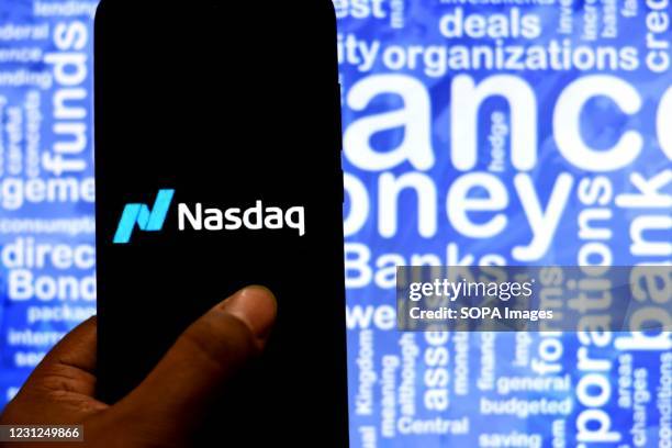 In this Photo illustration, a NASDAQ logo seen displayed on a Smartphone.