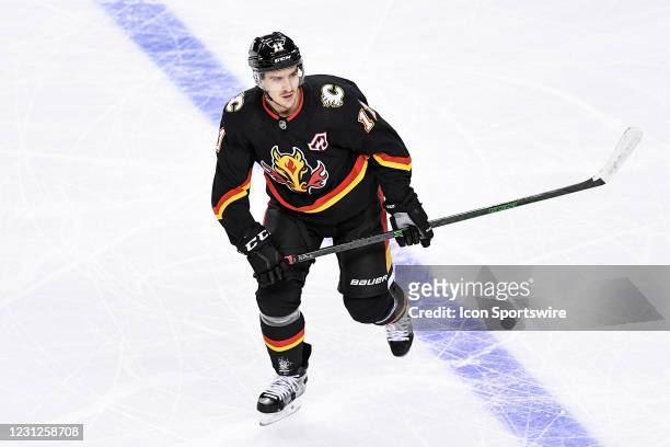 Calgary Flames Center Mikael Backlund skates during the first period of an NHL game where the Calgary Flames hosted the Vancouver Canucks on February...