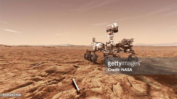 In this concept illustration provided by NASA, NASA's Perseverance rover will store rock and soil samples in sealed tubes on the planet's surface for...
