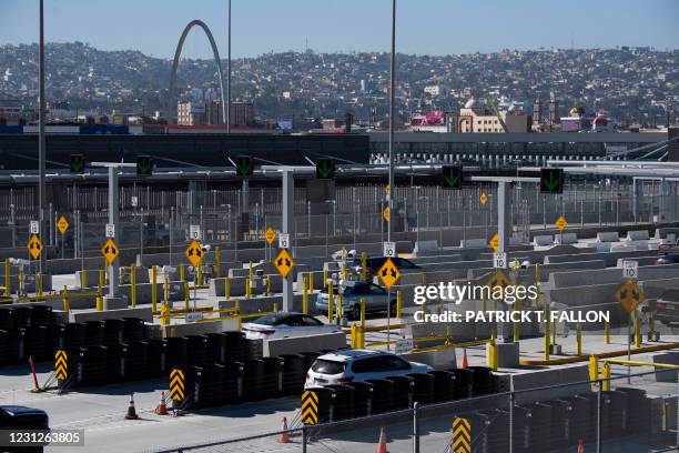 Vehicles enter a border checkpoint as they approach the Mexico border at the US Customs and Border Protection San Ysidro Port of Entry at the US...