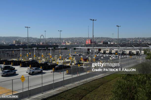 Vehicles enter a border checkpoint as they approach the Mexico border at the US Customs and Border Protection San Ysidro Port of Entry at the US...