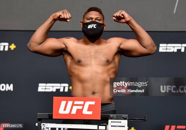 In this UFC handout, Curtis Blaydes poses on the scale during the UFC weigh-in at UFC APEX on February 19, 2021 in Las Vegas, Nevada.