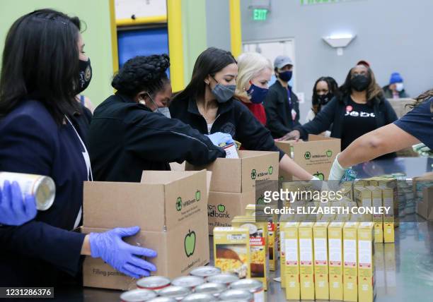 Texas Congresswoman Penny Morales Shaw, US Congresswomen Sheila Jackson Lee, Alexandria Ocasio-Cortez and Sylvia Garcia help distribute food at the...