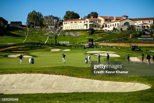 Course scenic view showing the clubhouse as Matthew Fitzpatrick of England plays his second shot from the ninth hole fairway during the third round...
