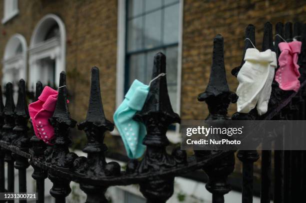 Children's socks seen during a virtual protest in front of the Irish Mother and Baby Home Commission's Office in Dublin. Protesters are calling for...