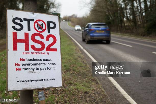 An anti-HS2 sign is pictured alongside the A413 on 20th February 2021 in Wendover, United Kingdom. Activists opposed to HS2 continue to occupy the...