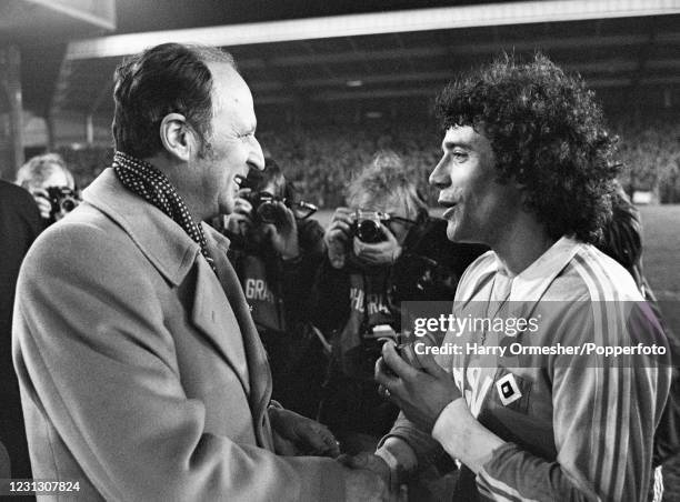 Kevin Keegan of Hamburger SV receives his runners-up medal after the European Super Cup Final 2nd Leg at Anfield on December 6, 1977 in Liverpool,...