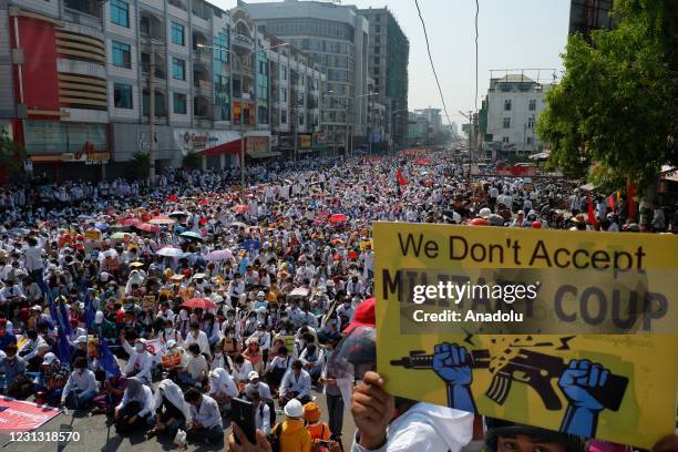 Numbers of people gather to protest against a military coup in Mandalay, Myanmar, February 22, 2021.