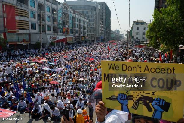 Numbers of people gather to protest against a military coup in Mandalay, Myanmar, February 22, 2021.