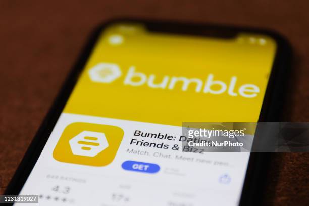 Bumble dating app logo on the App Store is seen displayed on a phone screen in this illustration photo taken in Poland on February 21, 2021.