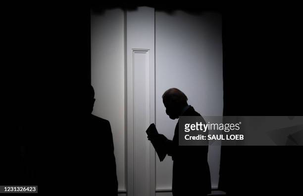 President Joe Biden leaves after speaking about the American Rescue Plan and the Paycheck Protection Program for small businesses in response to...