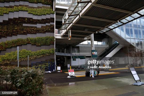 Passengers arrive at Vancouver International Airport in Vancouver, British Columbia, Canada on February 22, 2021. Travellers returning to Canada are...