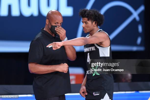 Head Coach Brian Shaw and Jalen Green of Team Ignite talk during the game against the Long Island Nets on February 22, 2021 at AdventHealth Arena in...