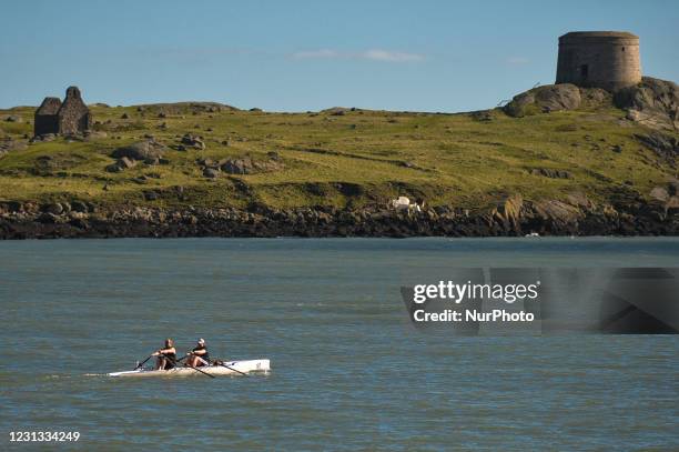 Two men practicing rowing near Dalkey Island, during Level 5 Covid-19 lockdown. On Monday, February 22 in Dalkey, Dublin, Ireland.