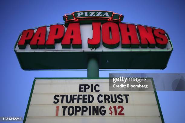 Signage outside a Papa John's International Inc. Pizza restaurant in Louisville, Kentucky, U.S., on Monday, Feb. 22, 2021. Papa John's International...